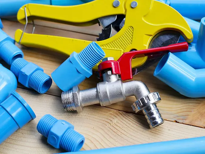 PVC fittings and a PVC cutting tool